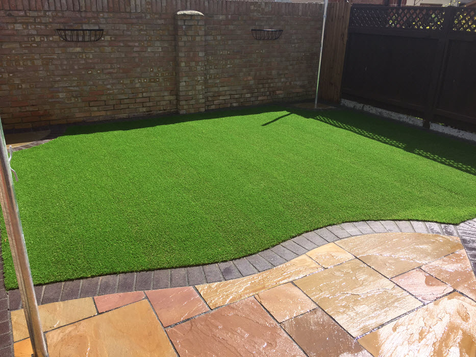 Artificial grass garden installation